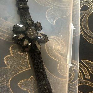 Black watch with flower face